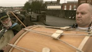 Drumming duo from opposite sides strike a beat of hope on Derry's Walls in new film