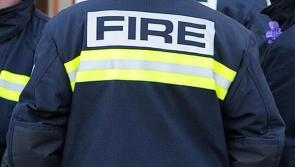 Firefighters free woman from two vehicle collision
