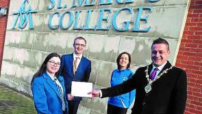 St Mary's College staff and pupils donation to Derry Mayor's charity