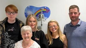 Marguerite  rings the bell at North West Cancer Centre