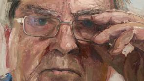 An official portrait of the late John Hume unveiled in Westminster