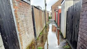 Concern after human waste found in flooded Derry laneway