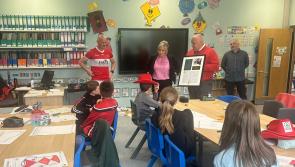 Michelle O’Neill presents Joe Biden-signed Seamus Heaney poem to primary school