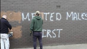 'Racist and fascist' graffiti removed from walls in Derry's Bogside