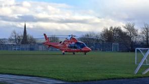 Air Ambulance lands at Derry school to deal with nearby incident
