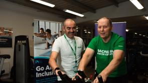 Norman defies life changing health setbacks to complete adapted triathlon
