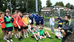 Celtic coaches teaching Don Boscos youngsters the values of the game