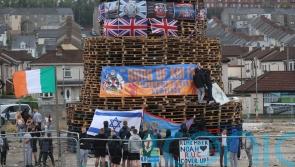 DUP leader condemns placing of flags and images on nationalist bonfire