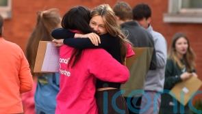 Smiles and hugs as pupils gather to receive GCSE results