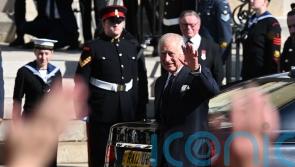 Thousands line streets of Belfast to catch glimpse of the King and Queen Consort