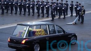 Queen’s family pay respects as her coffin arrives at Buckingham Palace