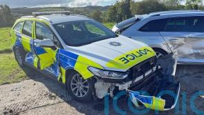 Man remanded on attempted murder charges after police cars rammed by tractor