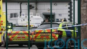 Police continue investigation into west Belfast social club shooting