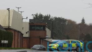 Man arrested after explosive device left outside police station