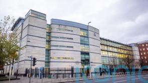 Man charged with causing bomb explosion in 1990