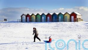 People wake up to snow as cold snap begins to sweep the UK