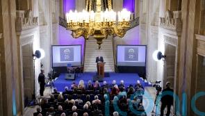 Commemorative event mixes reflections on the past and hopes for the future