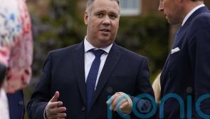 Seven men charged with attempted murder of senior police detective