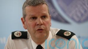 Investigation launched after details of three officers posted on bus shelter