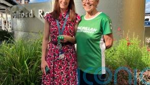 Woman who took on hike two months after brain haemorrhage hands medal to surgeon