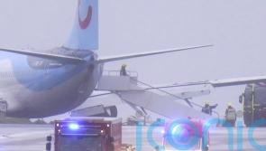 Third person dies and plane skids off runway as Storm Babet batters UK