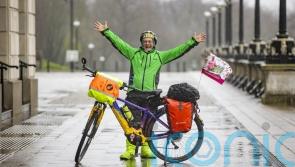 Timmy Mallett visits Stormont during Northern Ireland cycle trip