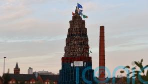 Politicians’ election posters appear on loyalist bonfires