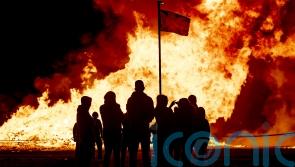 Police investigate election posters and flags on bonfires as hate incidents