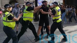 Dozens arrested as disorder continues, with fears of more violence to come