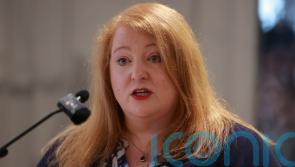 Cost of school phone pouch scheme criticised by Long