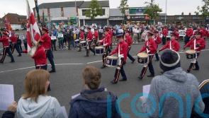 Orangemen parade passes by Ardoyne without incident as residents stage protest