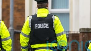 Police investigating hoax bomb calls at rail stations carry out searches