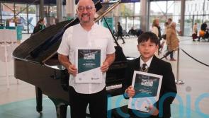 Boy, 10, and aid worker triumph in piano contest at Grand Central Station