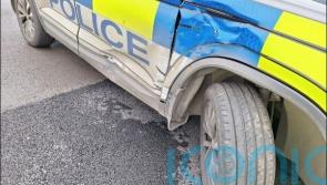 Two police officers injured after car rammed