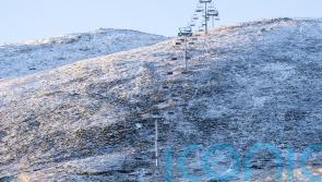 Snow falls across parts of UK after coldest night of the season