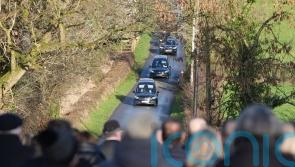 Community still in shock over deaths of father and son, funeral told