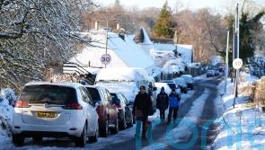 Heavy snow and freezing rain sweep in as amber warnings come into force