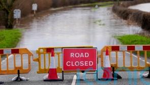 Severe flooding and snow disrupt travel as weather warnings remain