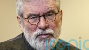 Gerry Adams says any compensation in ex-detainee case will be donated