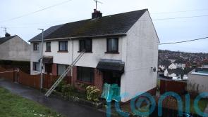Man arrested on suspicion of arson after four people rescued from burning house