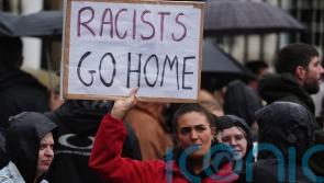 Northern Ireland one petrol bomb away from a racist murder, Belfast rally hears