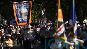Tens of thousands take part in Twelfth celebrations in scorching temperatures