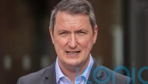 Families barricading themselves in homes after racist attacks, says Finucane