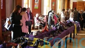 Shoes of domestic abuse survivors displayed at Stormont
