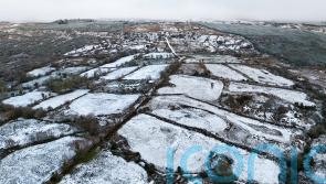 Fresh weather warnings issued as snow cancels flights and shuts schools