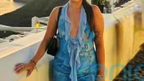 Woman killed when car collided with bus near Belfast named