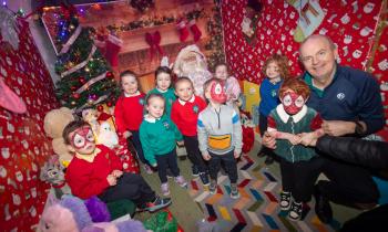 IN PICTURES: Santa welcomes families to Hollybush Primary School open day