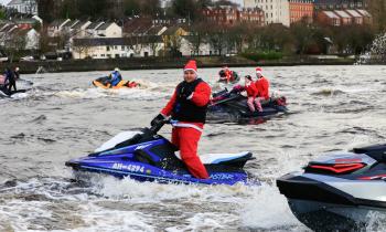 IN PICTURES: Santa ditches sleigh for jetski on Derry's River Foyle