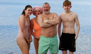IN PICTURES: Christmas Day swim at Ludden Beach