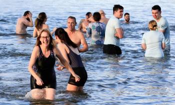 IN PICTURES: Annual Christmas Day Swim for Children's Eye Cancer